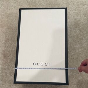 Chic Gucci box with a sleek design. Perfect for gifting.